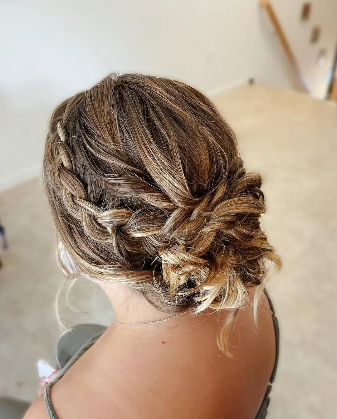 trendy summer braids hairstyle 2026 Romantic Braided Low Bun