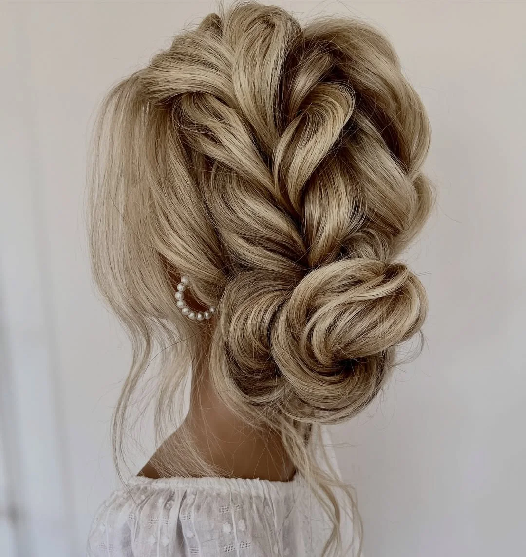 trendy summer braids hairstyle 2026 Elegant Braided Low Bun