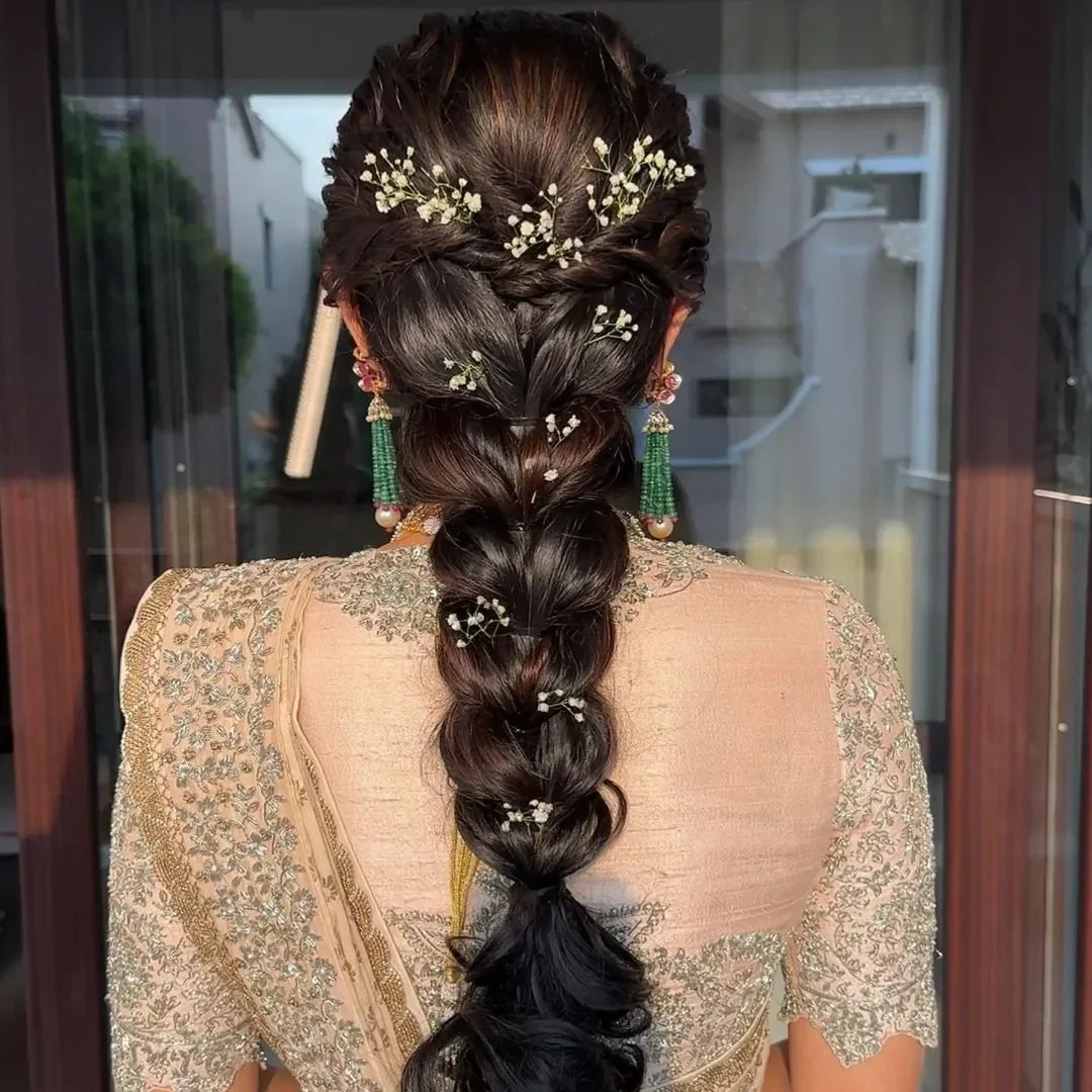 trendy summer braids hairstyle 2026 Voluminous Bubble Braid With Floral Details