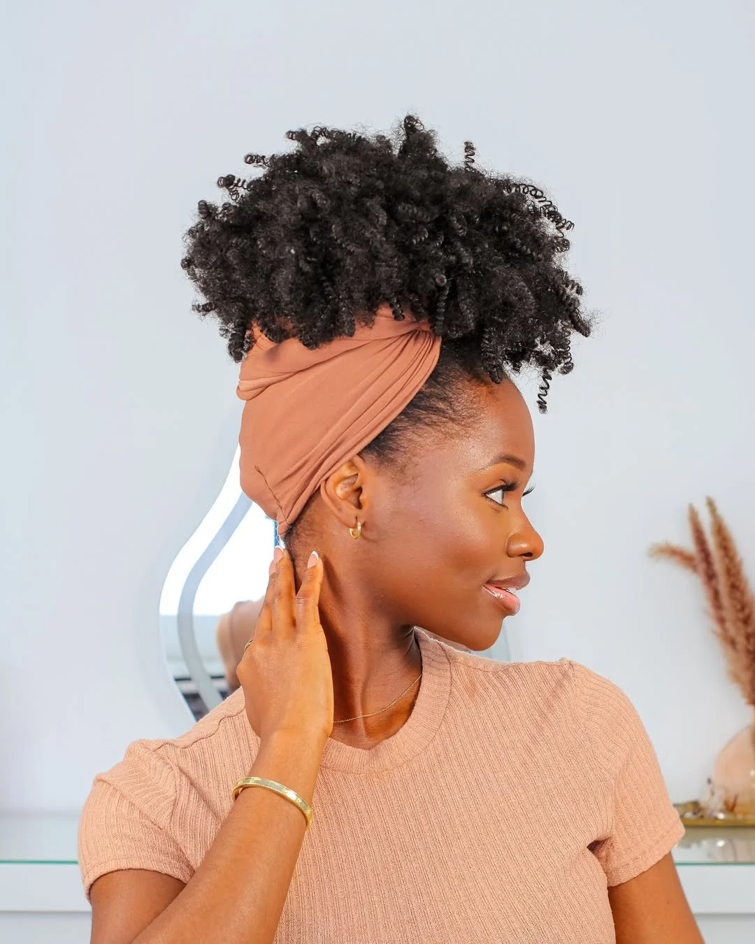 trendy summer hairstyle black women 2026 Natural Puff With Neutral Headwrap