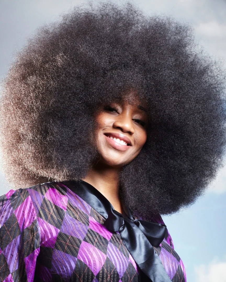 trendy summer hairstyle black women 2026 Extra Voluminous Natural Afro