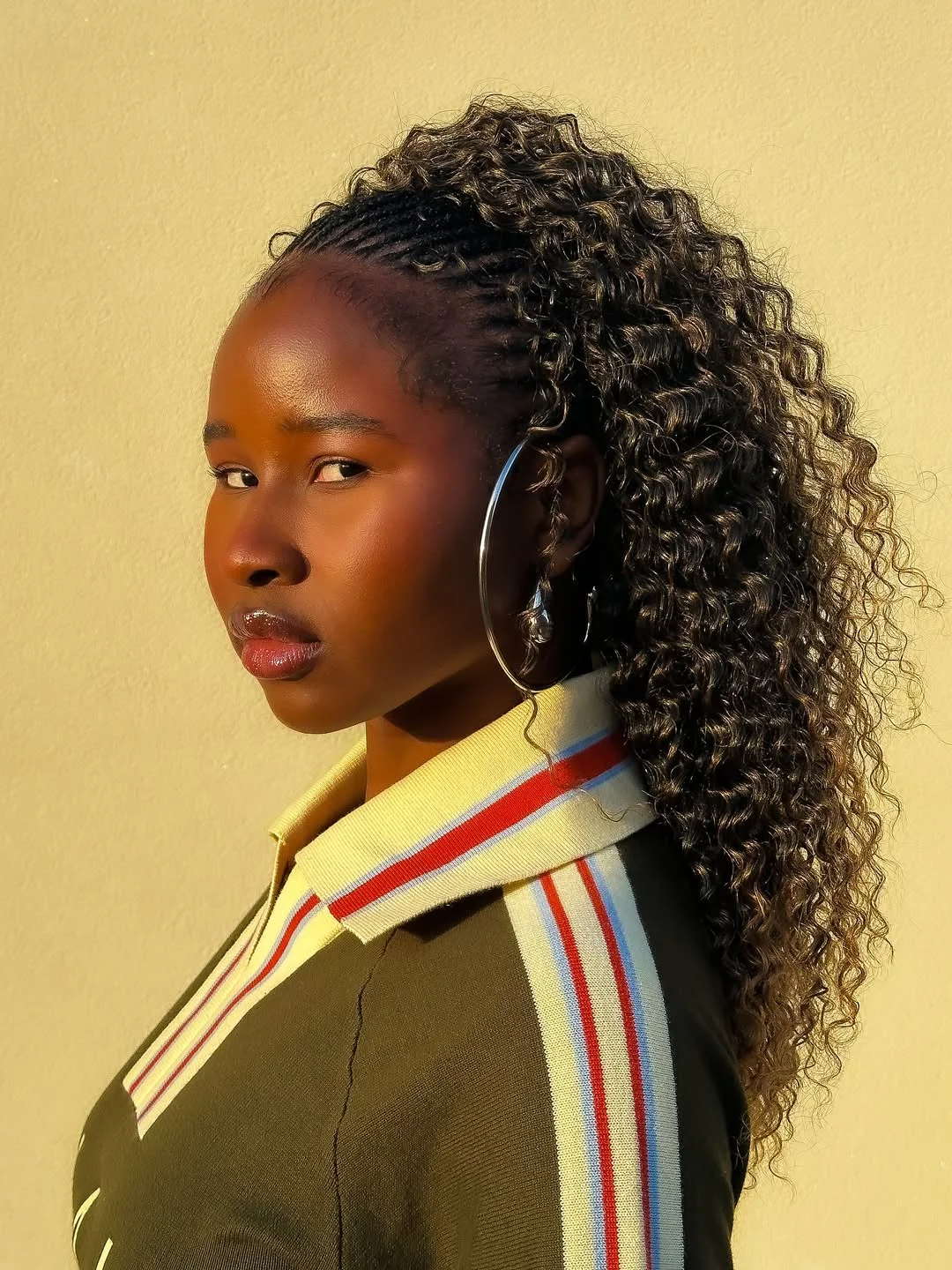 trendy summer hairstyle black women 2026 Curly High Ponytail With Braided Base