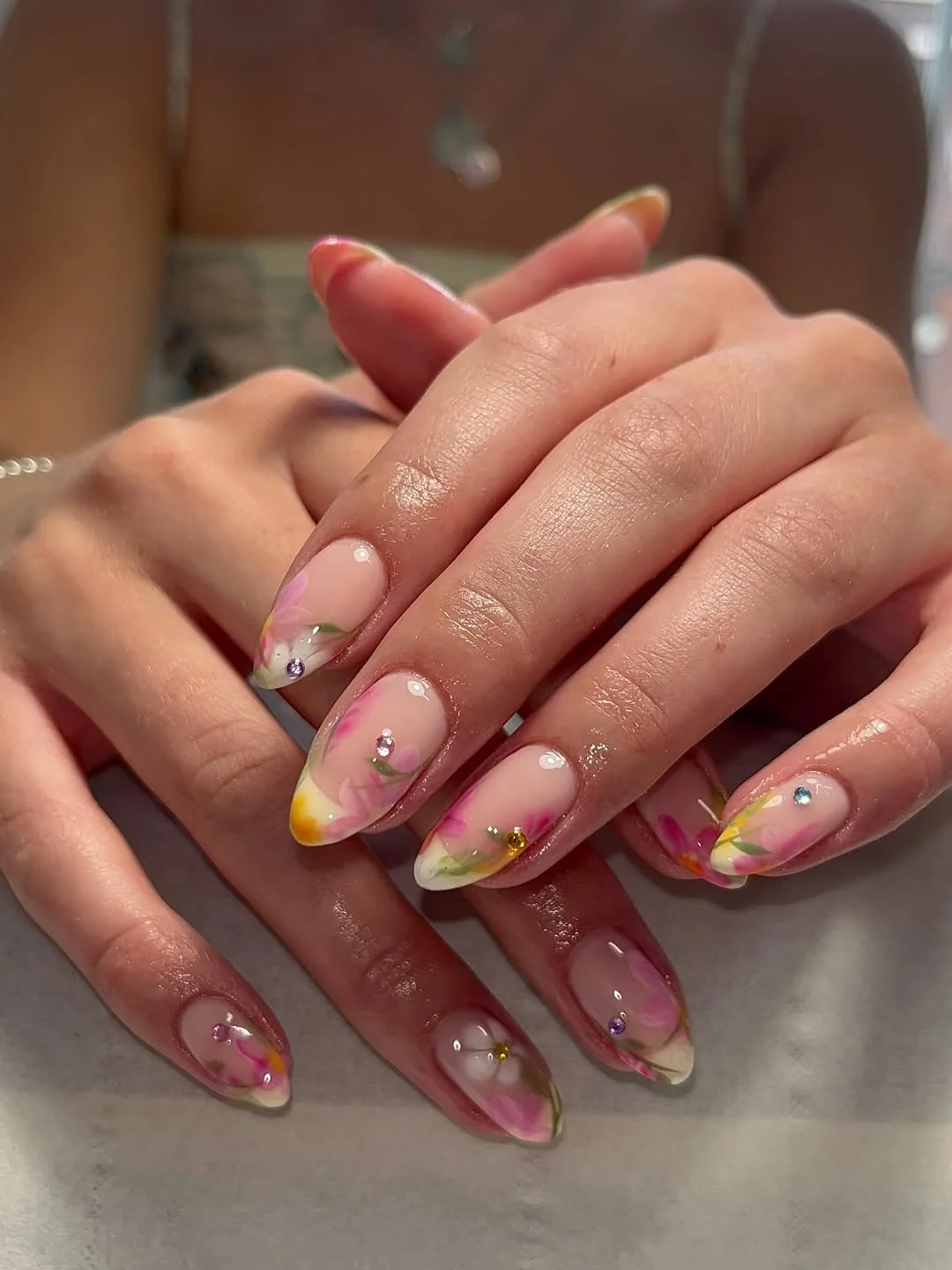 trendy summer nails 2026 Glossy Pink Floral Almond Nails