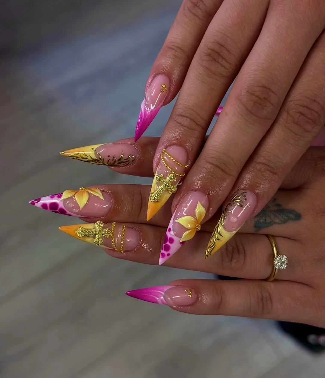 trendy summer nails 2026 Pink And Yellow Stiletto Nails