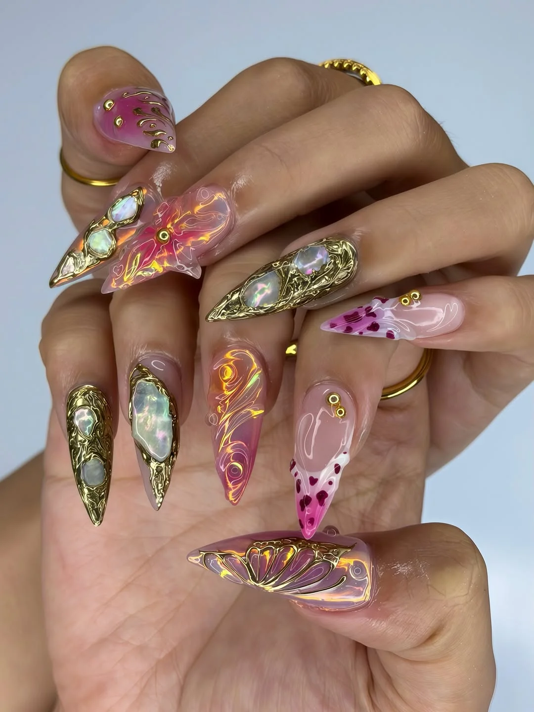 trendy summer nails 2026 Pink Aura Stiletto Nails With Gold Chrome