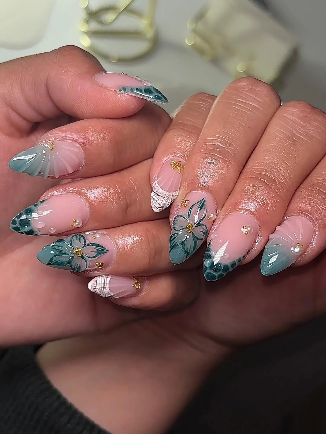 summer vacation nails 2026 Soft Sage Floral Almond Nails