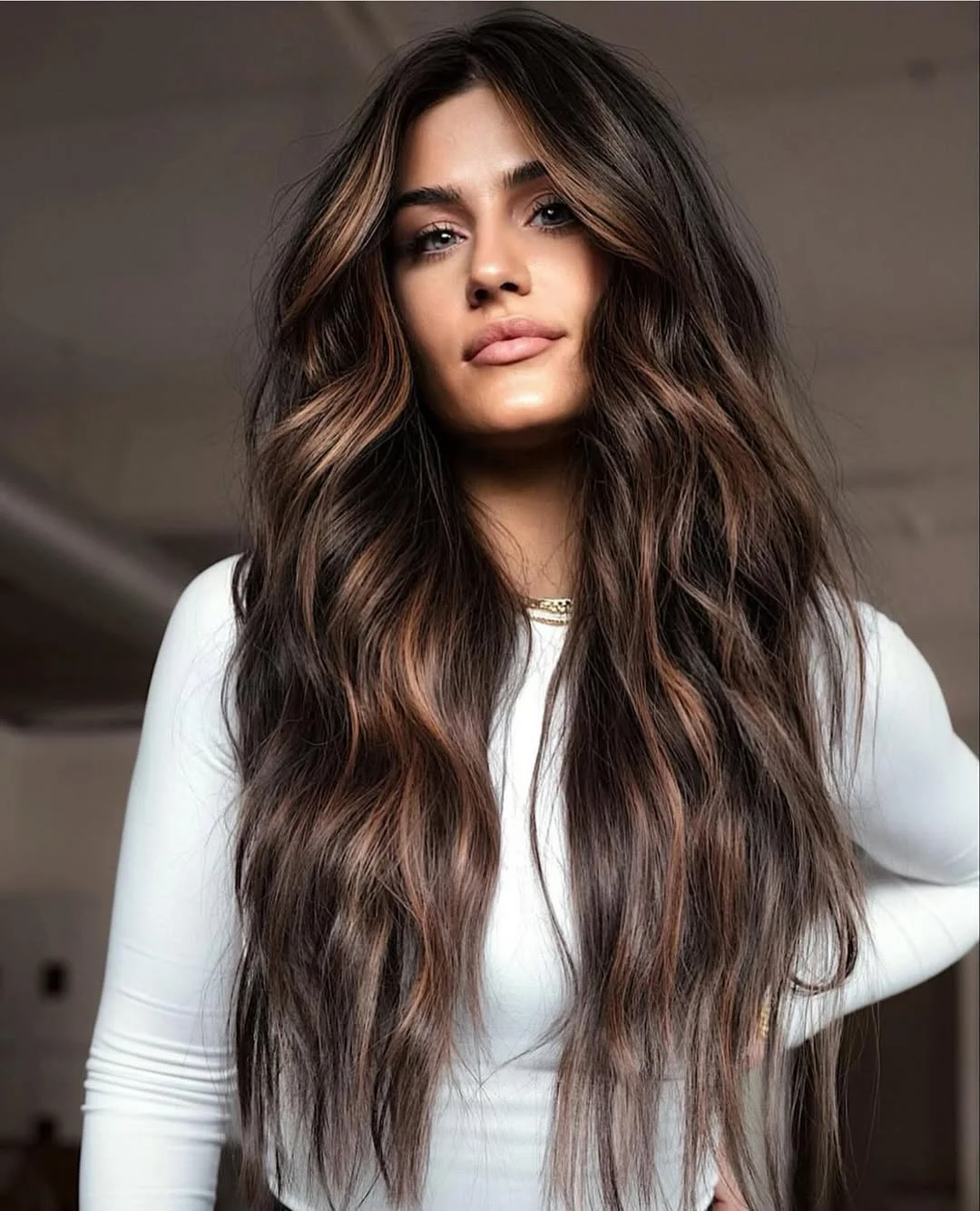warm summer brunette hair color 2026 Dimensional brunette with warm ribbon highlights