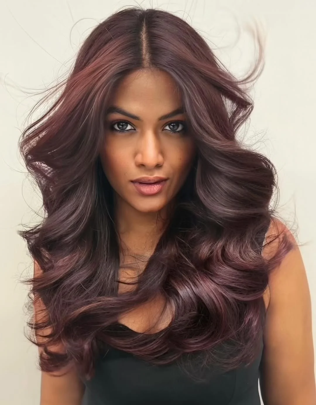 warm summer hair color for dark skin 2026 Deep Burgundy Waves with Glossy Dimension