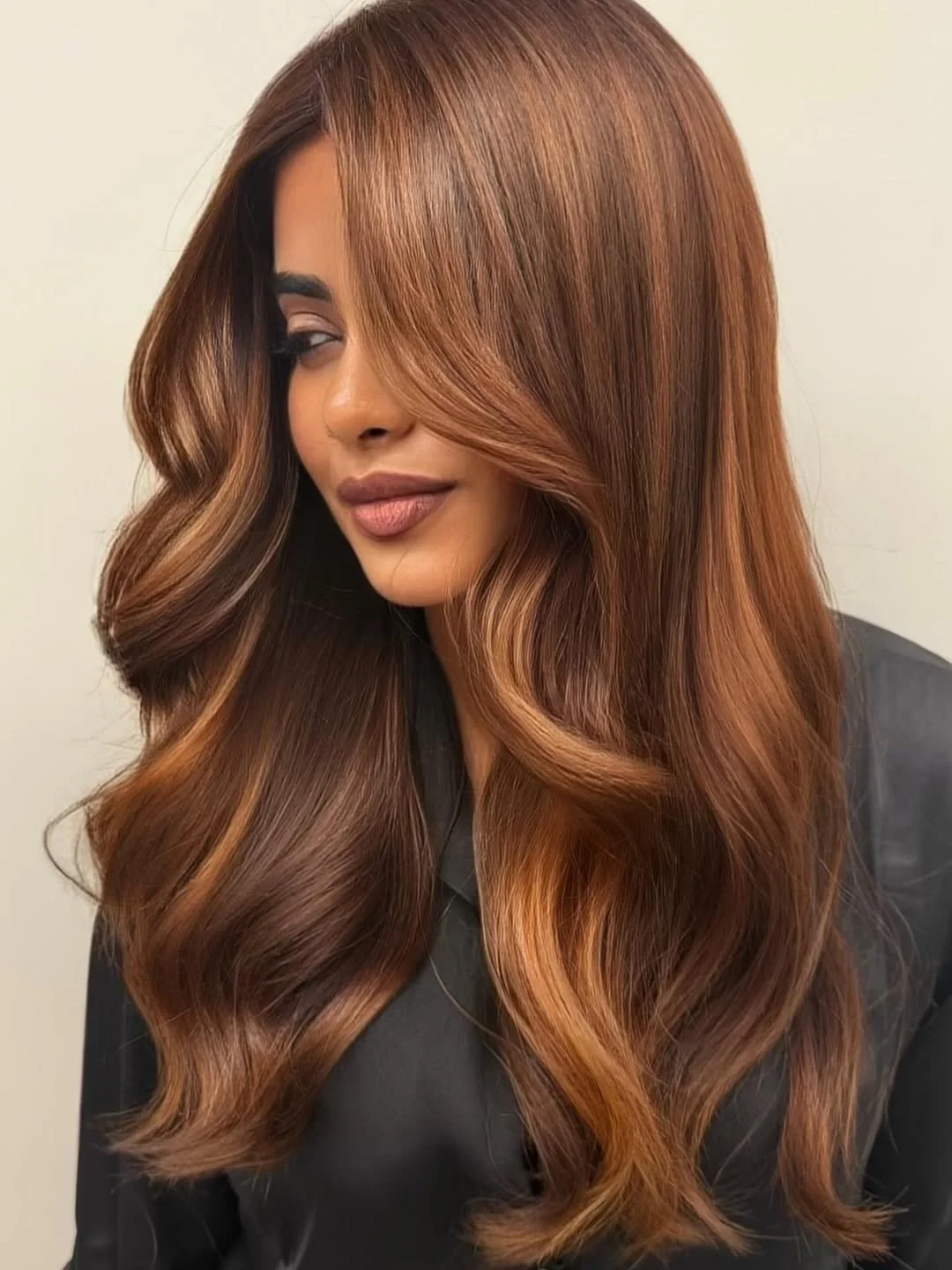 warm summer hair color for dark skin 2026 Golden Copper Balayage with Soft Volume