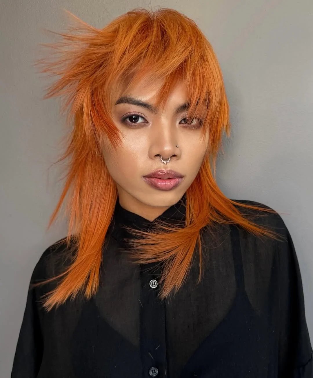 warm summer hair color for dark skin 2026 Bold Copper Ginger Shag with Edge