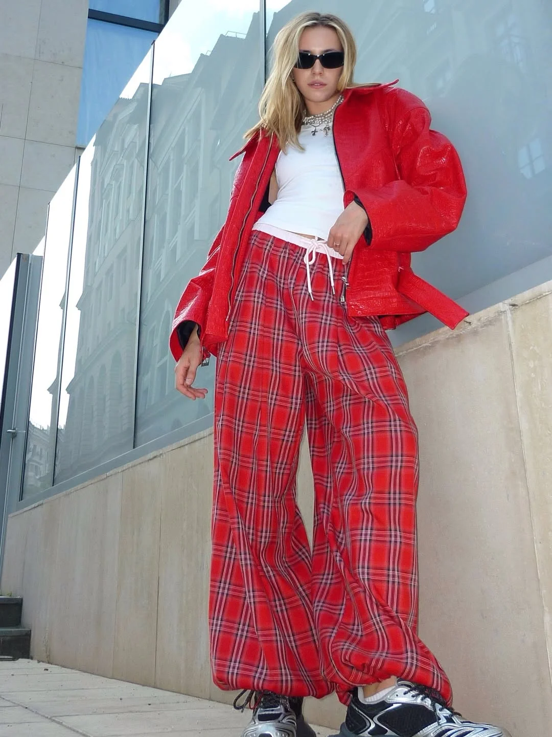 chic fall outfits for women in 30s style 2026 Plaid Trousers and Modern Biker Energy