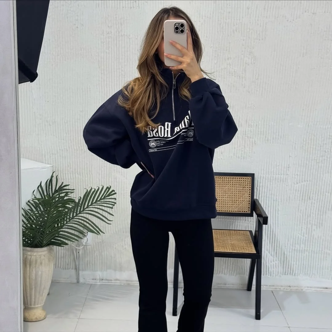 chic fall outfits with leggings and sneakers 2026 The Oversized Quarter Zip Trend Taking Over Fall 2026