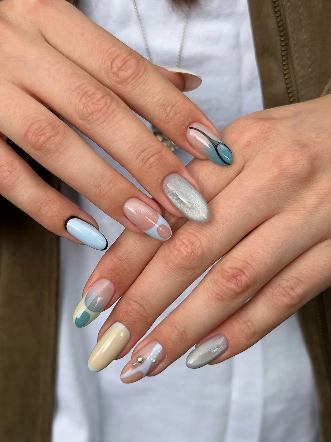 cool july nail colours ideas 2026 Coastal Blue and Silver Mix