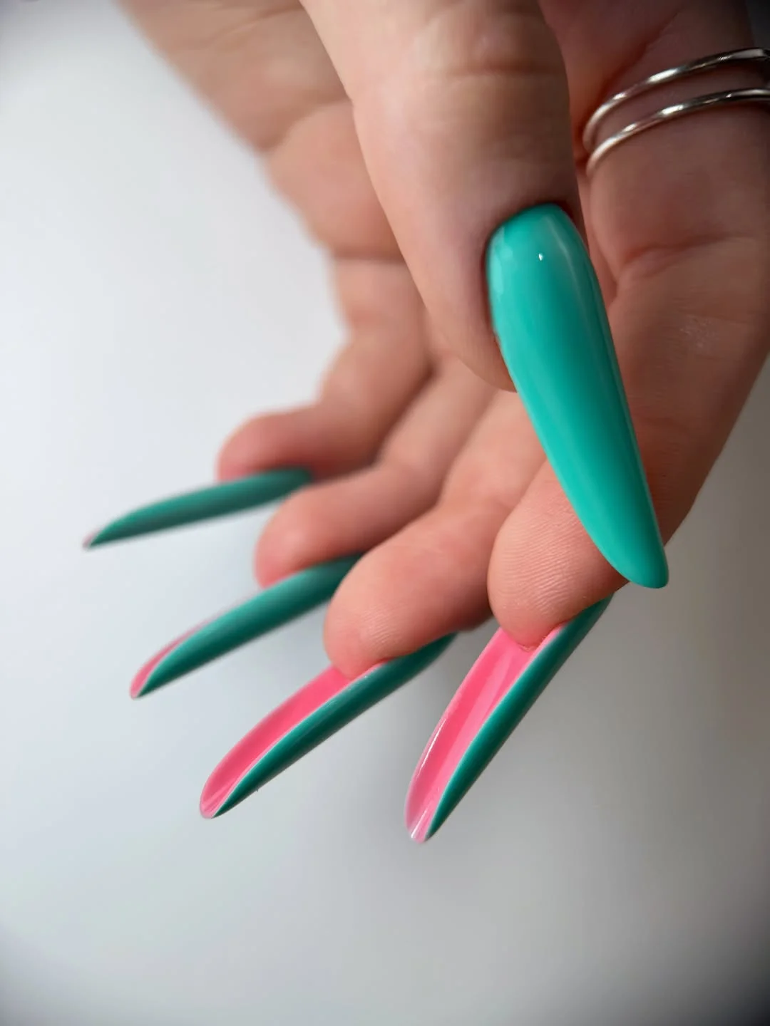 cool july nail colours ideas 2026 Tropical Mint and Pink Stiletto Nails