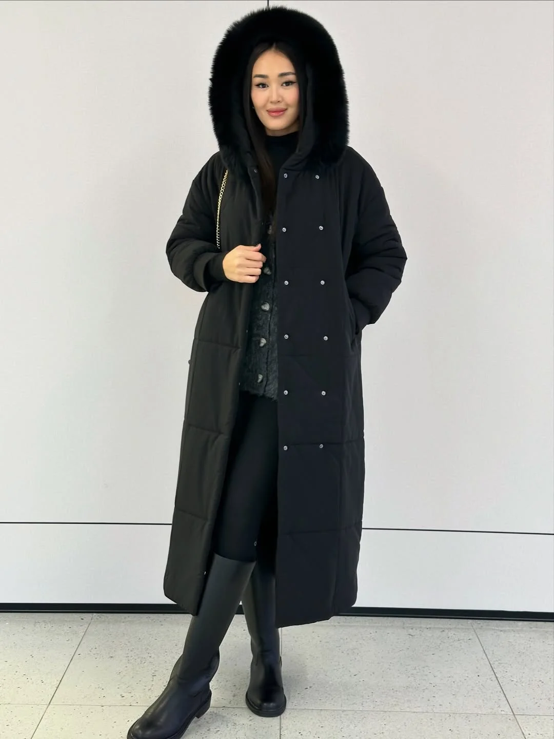 cute fall outfits with boots and leggings 2026 Long Black Puffer With Tall Boots