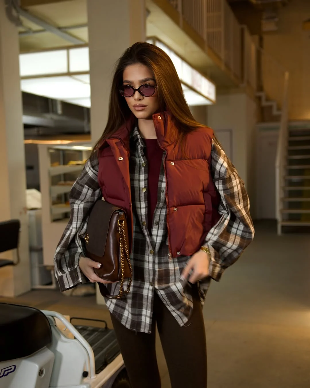 cute fall outfits with boots and leggings 2026 Rust Puffer Vest And Plaid Shirt Perfection