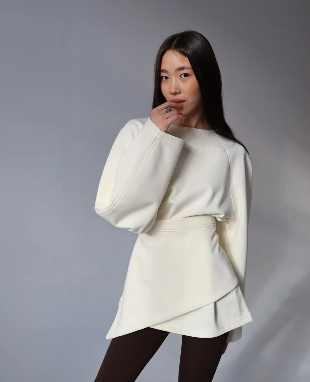 cute fall outfits with boots and leggings 2026 Soft Cream Layers With Dark Leggings
