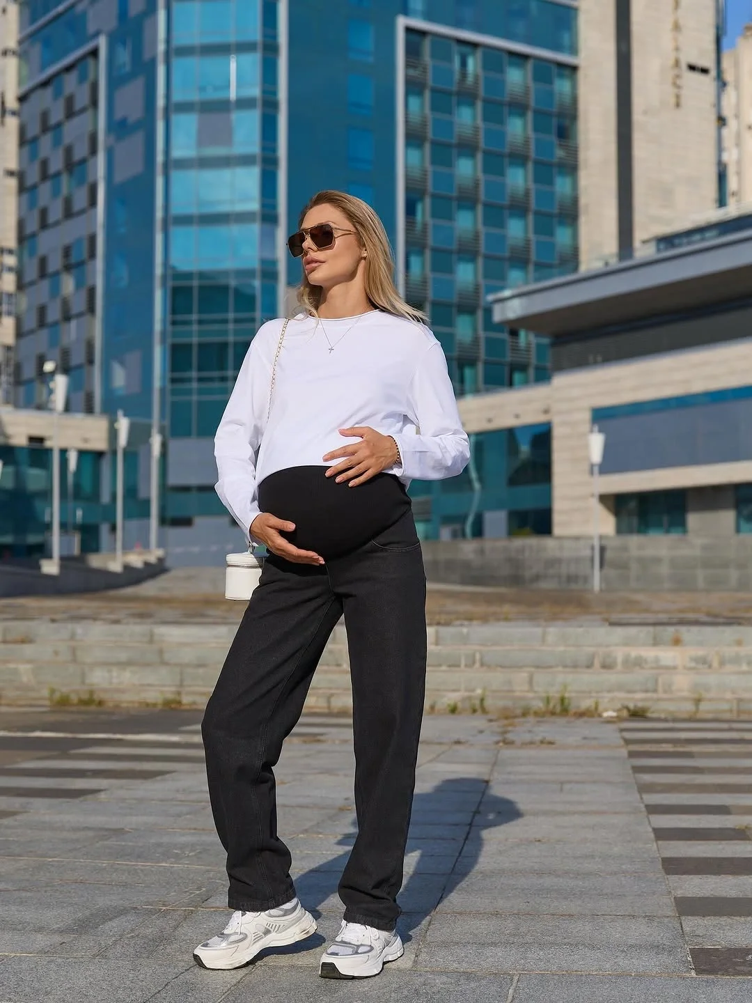 cute pregnancy outfits fall 2026 Relaxed Black Jeans with a Classic White Top