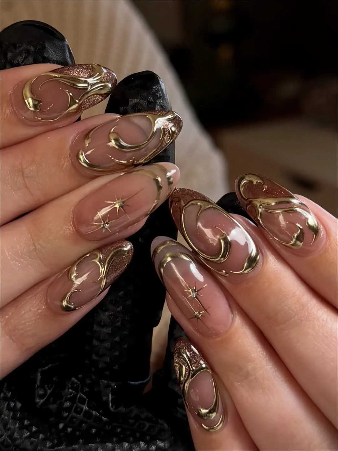 cute summer oval nails 2026 Golden Chrome Swirls with a Glamorous Edge