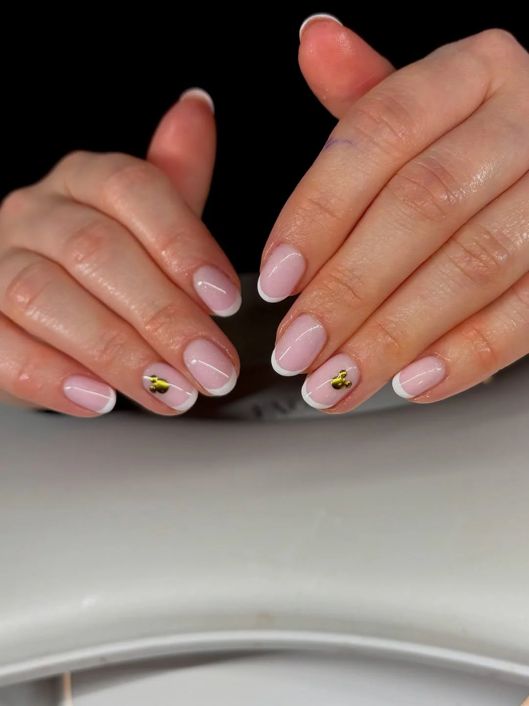 cute summer oval nails 2026 Short French Oval Nails with Tiny Gold Accents