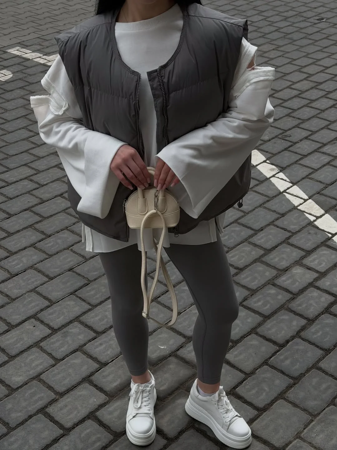 fashionable fall outfits with vests 2026 Sporty Street Style with a Minimalist Gray Vest