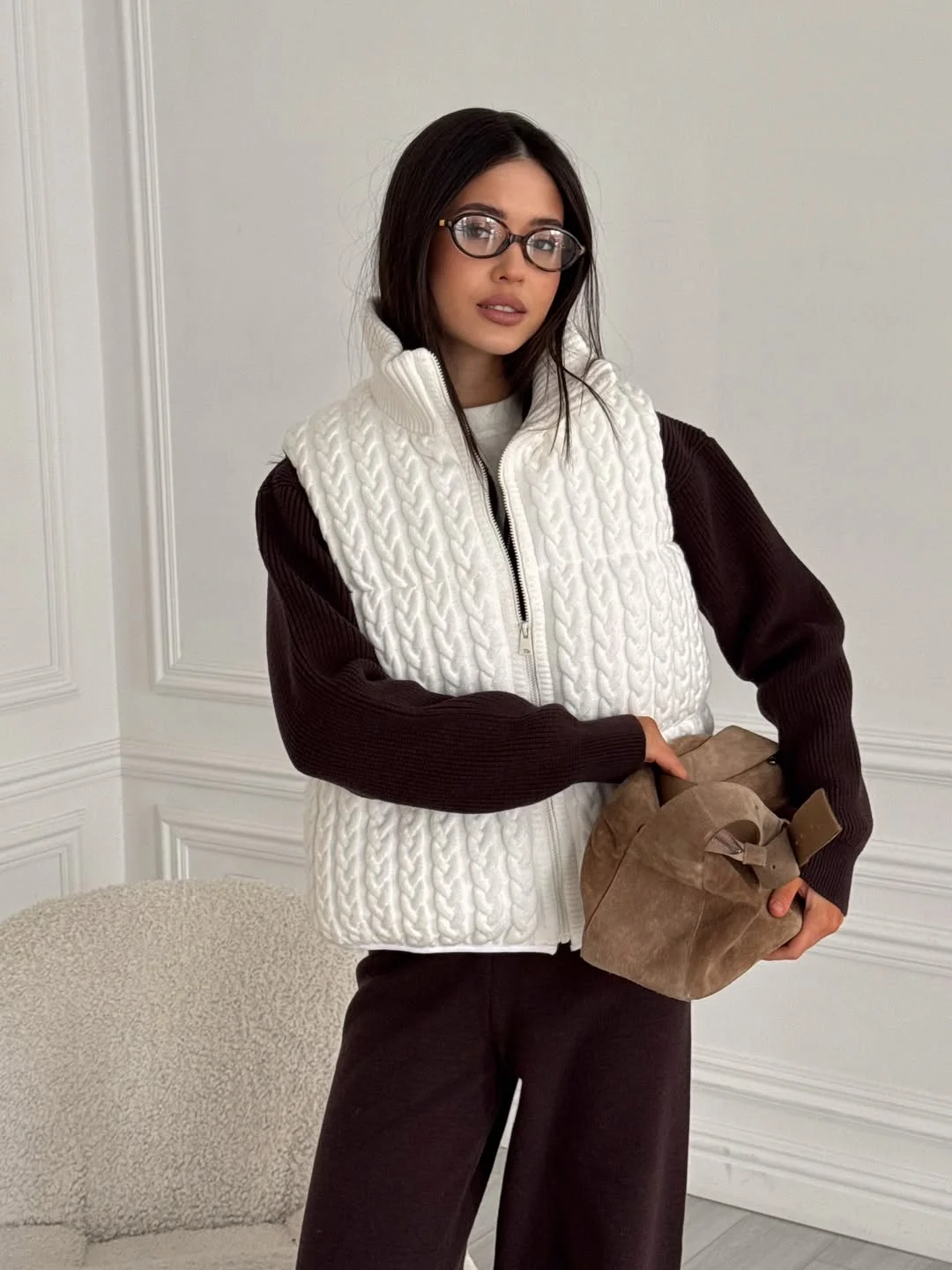 fashionable fall outfits with vests 2026 White Cable Knit Vest and Rich Chocolate Layers