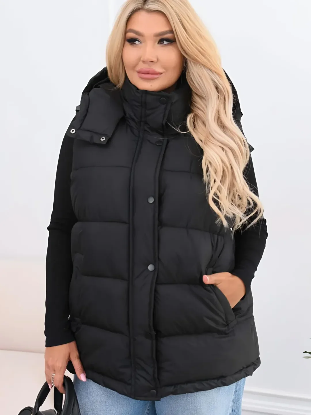 modern fall vest outfits for women 2026 Oversized Black Puffer For Cold Autumn Mornings