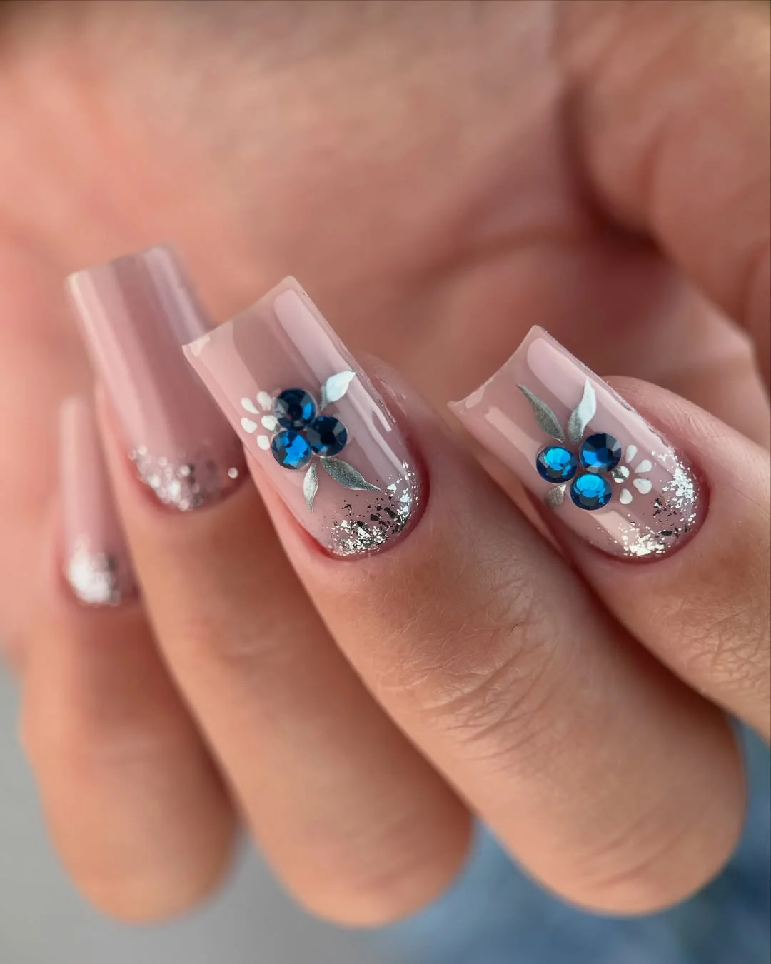 modern june manicure ideas 2026 Blue Crystal Floral Nails with Soft Glam Shine