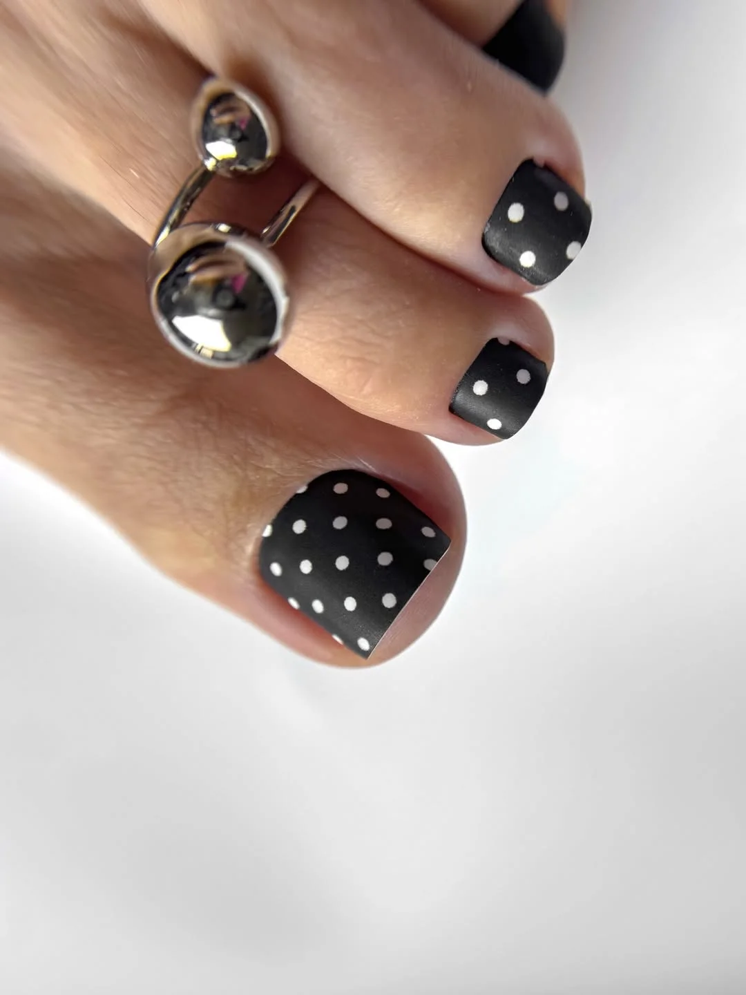 modern summer pedicure nail art 2026 Modern Black Polka Dot Chic
