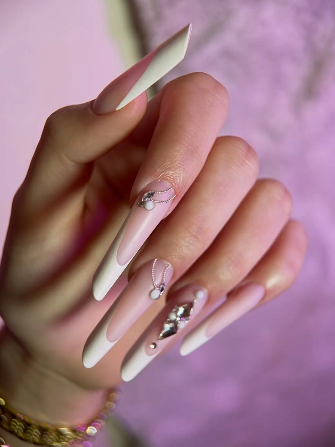 pretty july nails design ideas 2026 Elegant White French Coffin Nails with Crystal Details