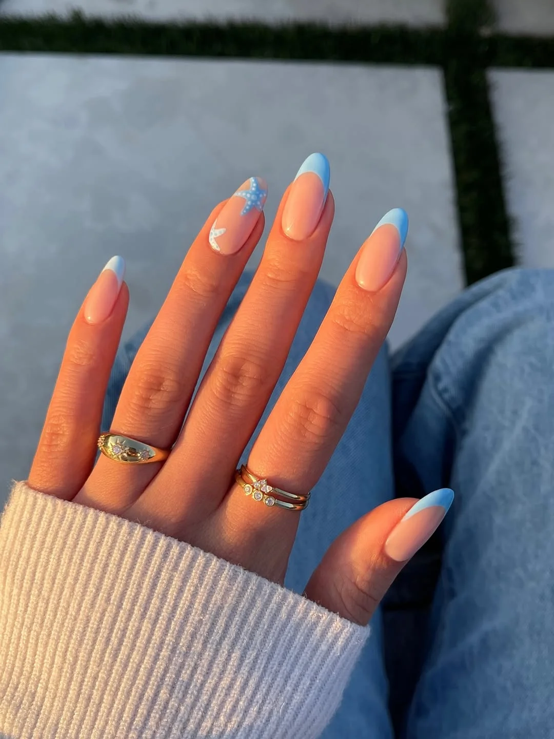 pretty starfish summer nails 2026 Blue French Starfish Nails With Coastal Simplicity
