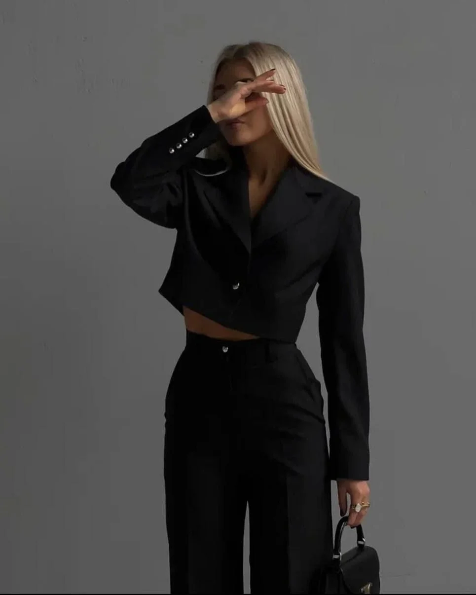sophisticated chic fall outfits pants 2026 Modern Black Suiting with a Fashion Forward Twist