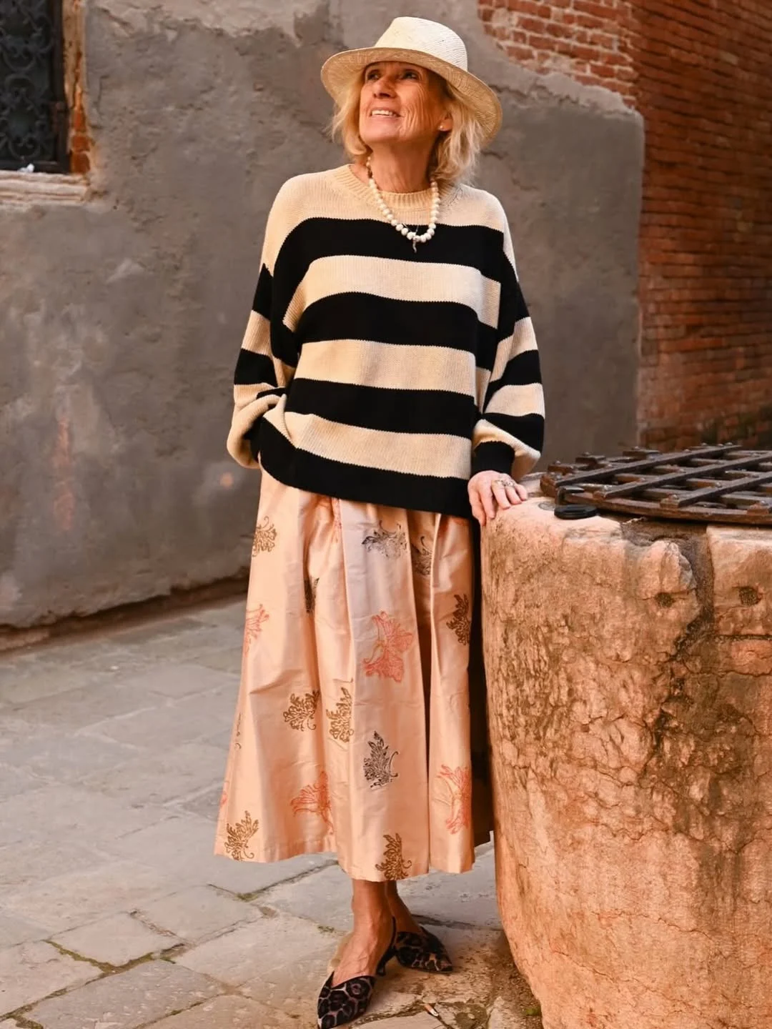 sophisticated what to wear in fall 2026 over 50 The Relaxed Stripe Sweater and Printed Midi Skirt Formula