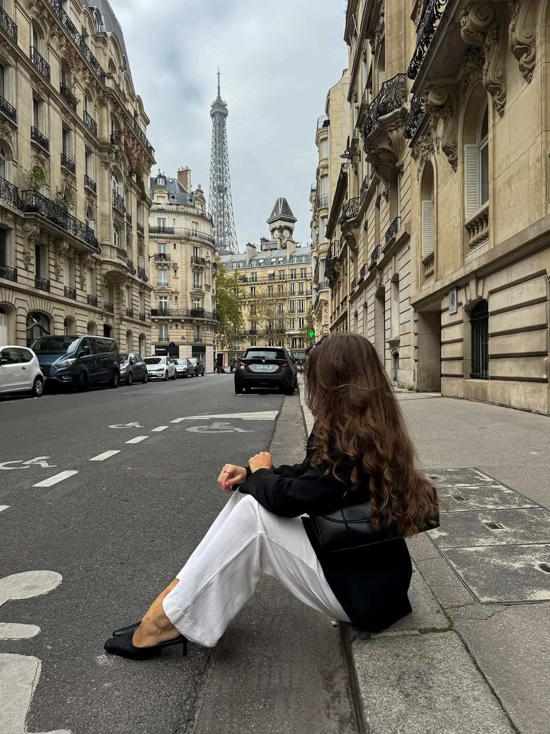 stylish fall travel wardrobe for women 2026 Parisian Contrast with Wide-Leg Elegance