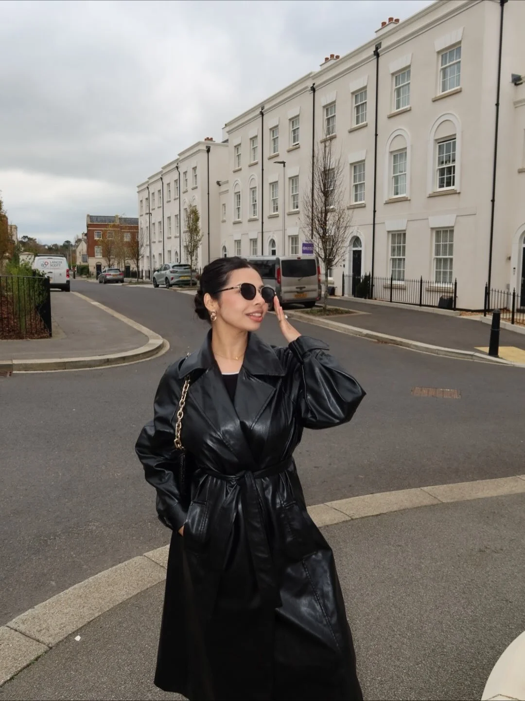 stylish fall travel wardrobe for women 2026 The Modern Leather Trench Formula