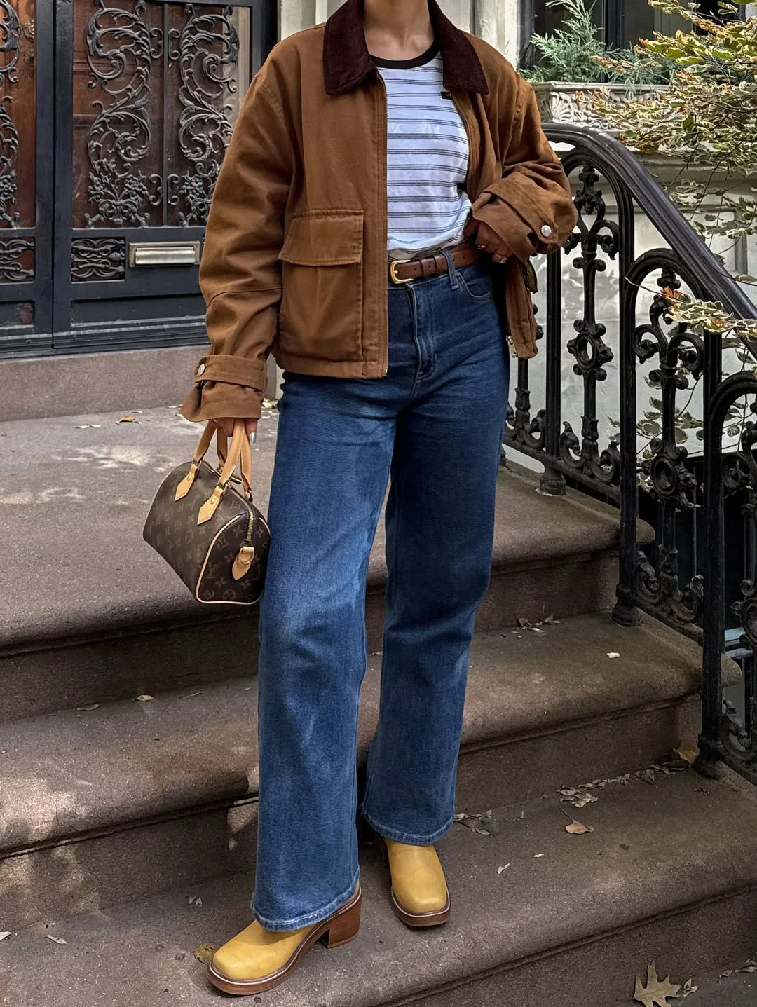 stylish fall travel wardrobe for women 2026 Vintage Utility Meets Relaxed Weekend Denim