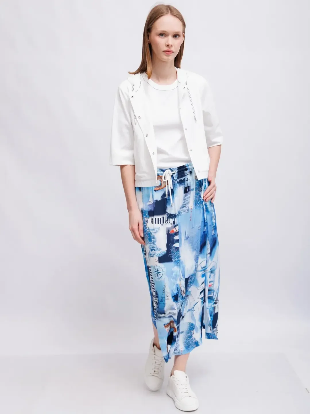 trendy fall skirt and sneakers outfits 2026 Artistic Printed Skirts with Casual White Sneakers