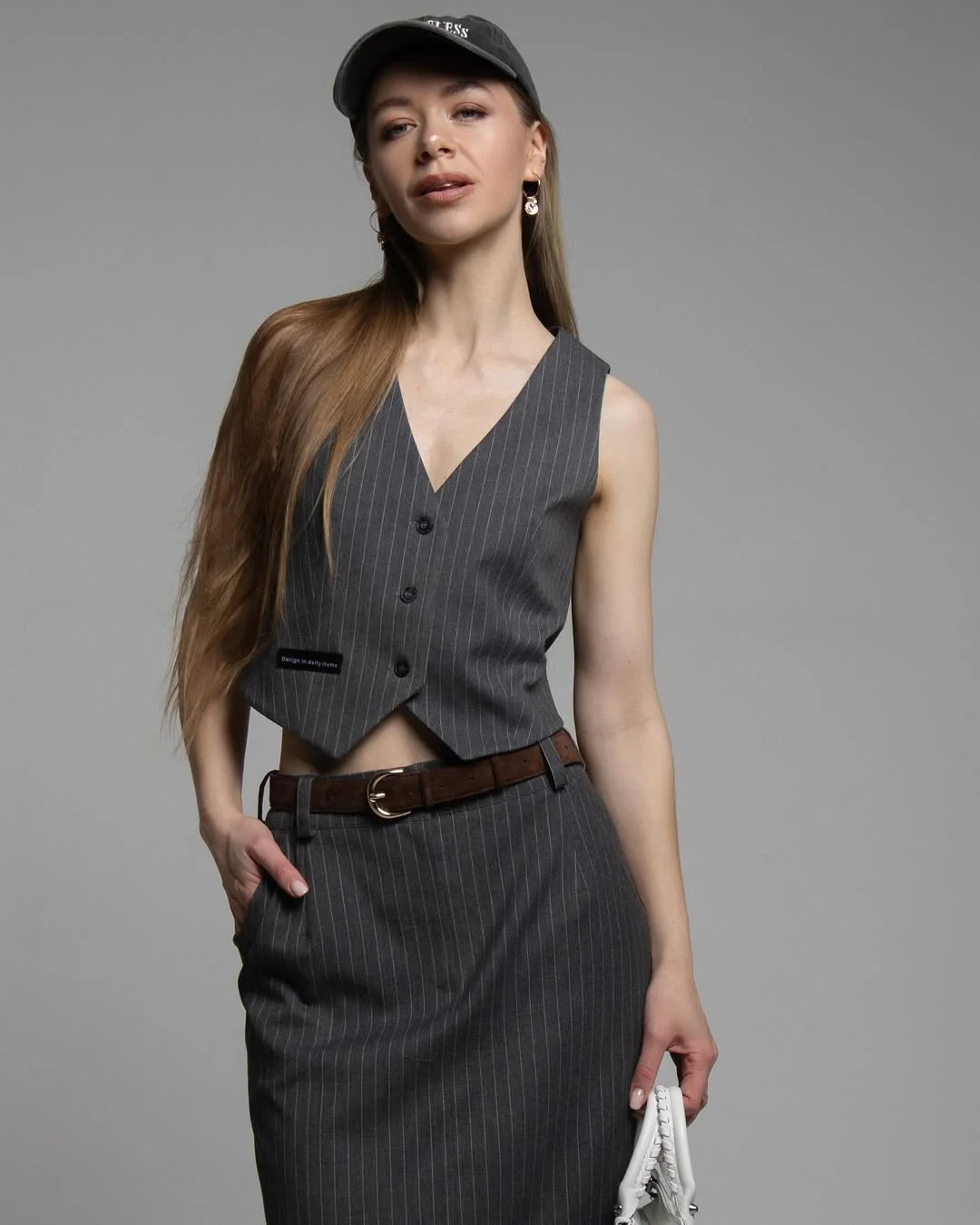 trendy fall skirt and sneakers outfits 2026 Modern Corporate Dressing with a Sleeveless Vest Set