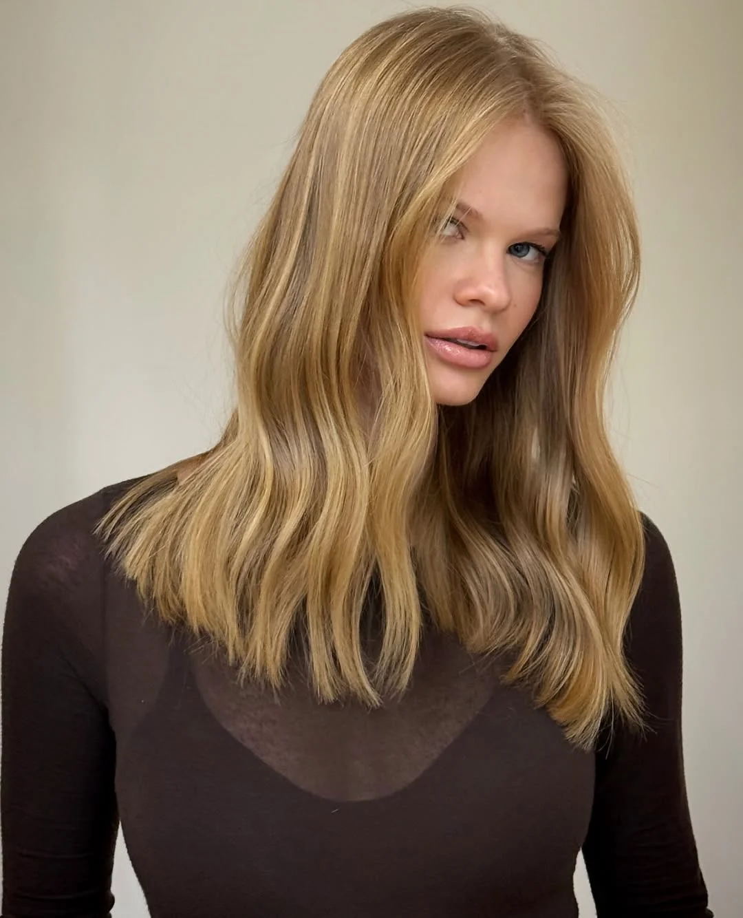 trendy july hair colour ideas 2026 Buttercream Blonde with Effortless Summer Movement