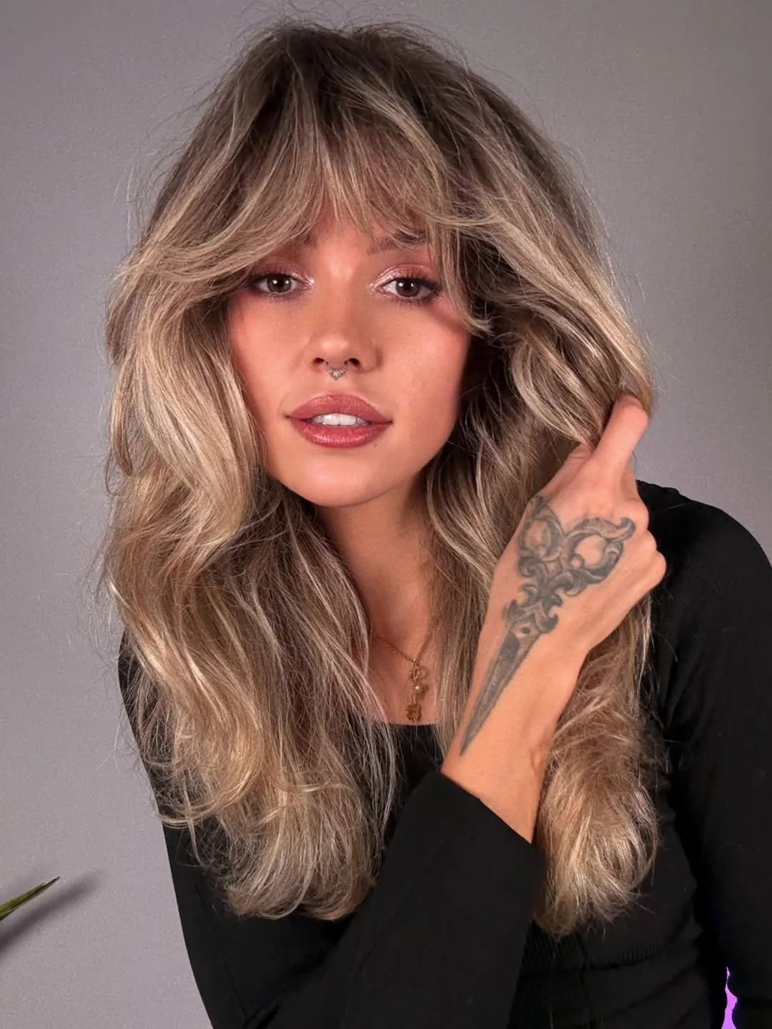 trendy july hair colour ideas 2026 Smoky Beige Blonde With Feathered Fringe