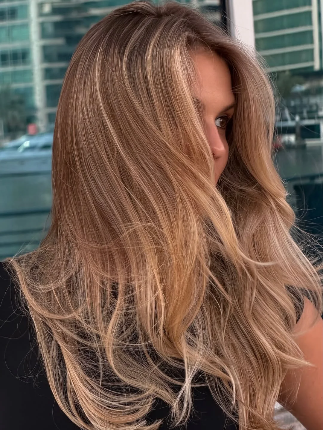 trendy july hair colour ideas 2026 Soft Champagne Blonde With Invisible Layers