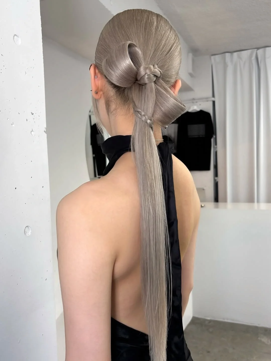 august hairstyles and color ideas 2026 Architectural Loop Ponytail With Silver Blonde Shine