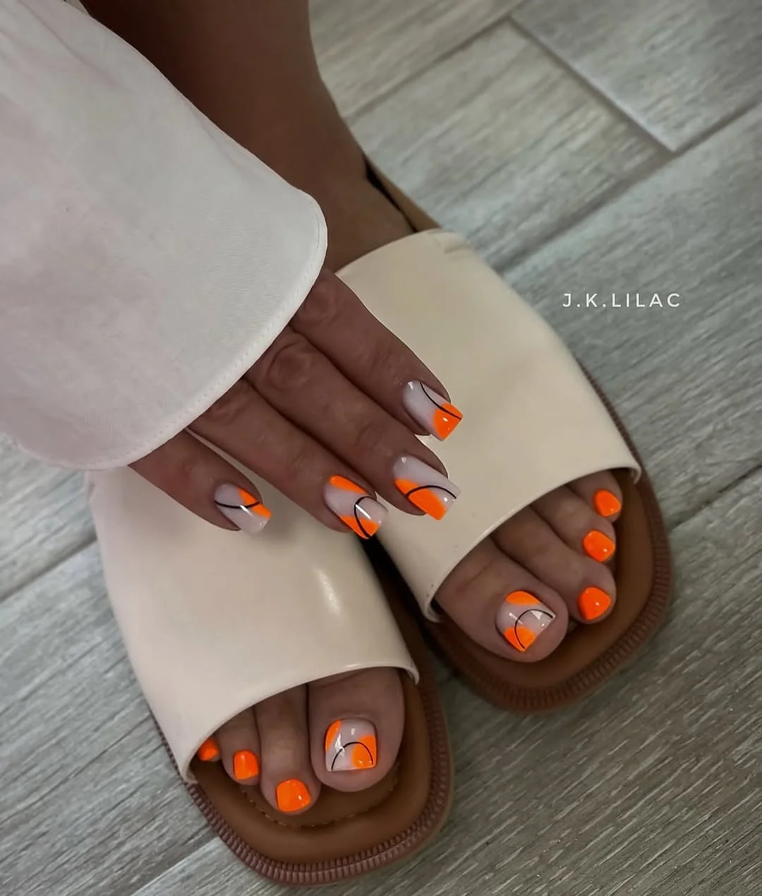 august pedicure nails ideas 2026 Modern Neon Orange Accent Design