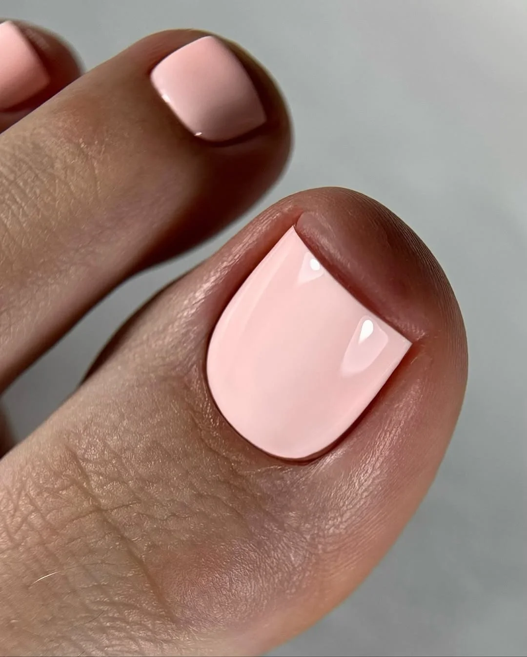august pedicure nails ideas 2026 Soft Blush Minimalist Pedicure