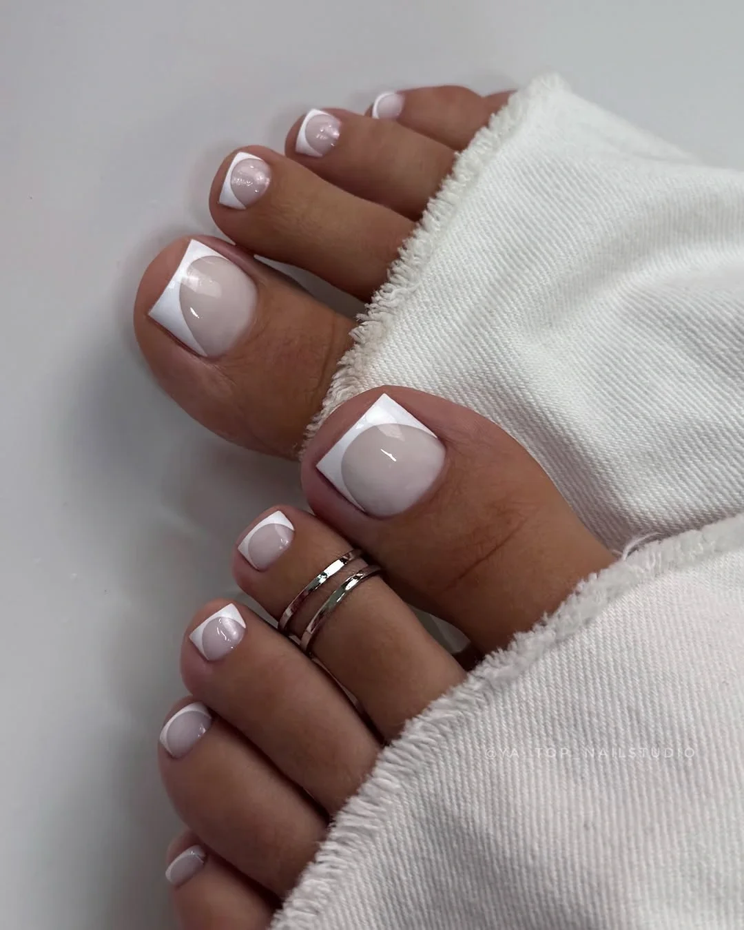 august pedicure nails ideas 2026 Classic White French Pedicure With A Modern Twist