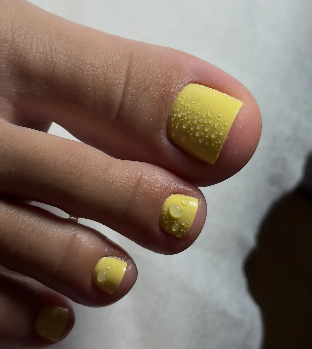 august pedicure nails ideas 2026 Sunny Yellow Gel Pedicure