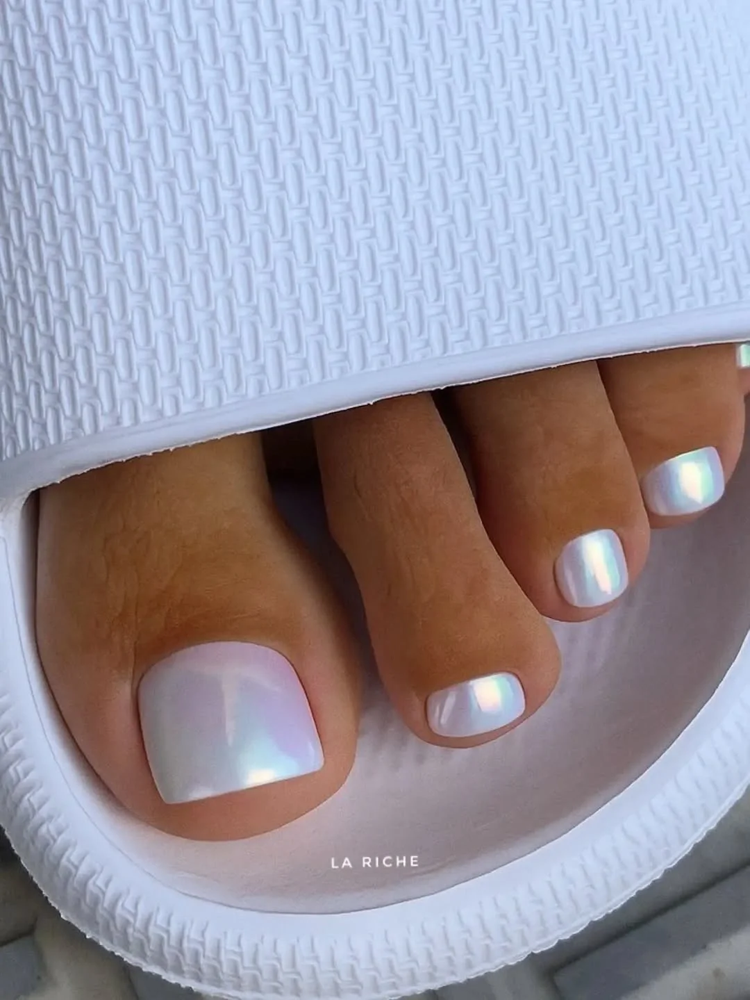 august pedicure nails ideas 2026 Pearly White Chrome Pedicure