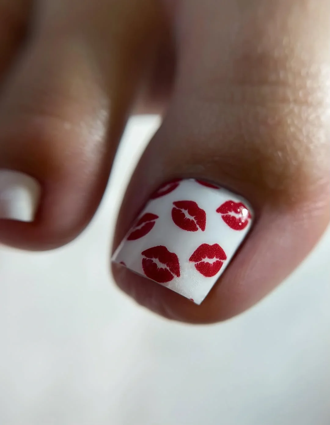 august toe nails 2026 Classic Red Kiss Print