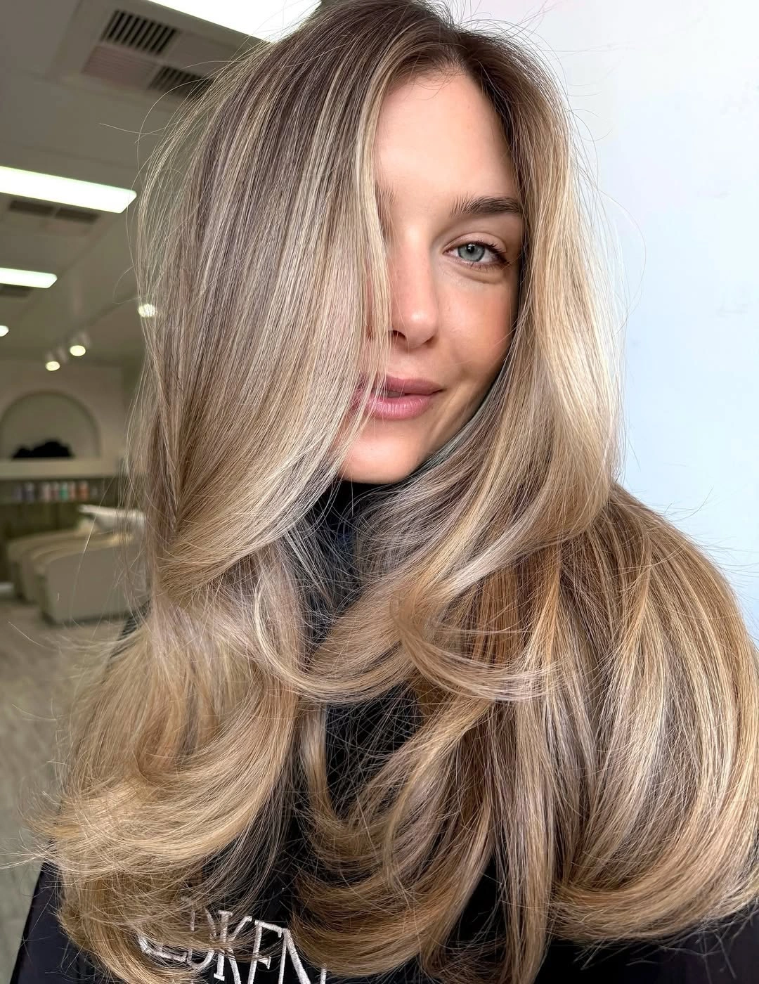beautiful dirty blonde hair color Feathered Layers with Warm Dirty Blonde Glow