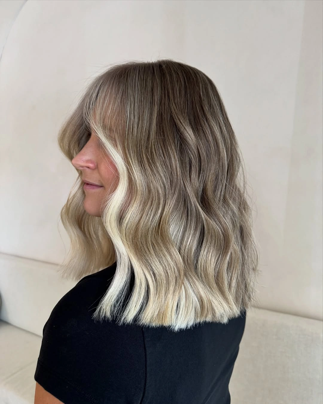 beautiful dirty blonde hair color Soft Wavy Lob with Bright Blonde Ends